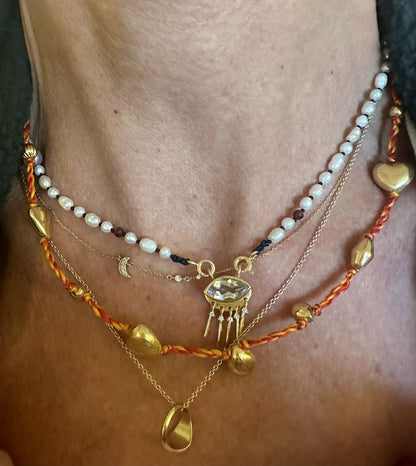 Gold Eye Charm