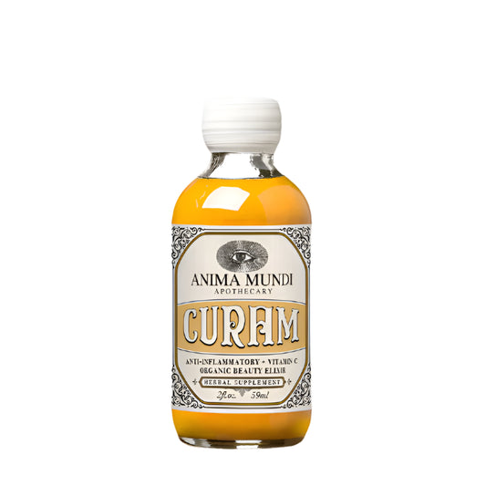 A bottle labeled 'ANIMA MUNDI CURCUM' with a yellowish liquid visible through the transparent glass. The label includes text that seems to describe the product as an anti-inflammatory and vitamin C-rich elixir.